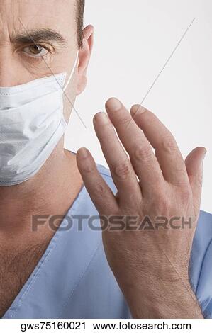 Stock Image - Portrait of a male surgeon. Fotosearch