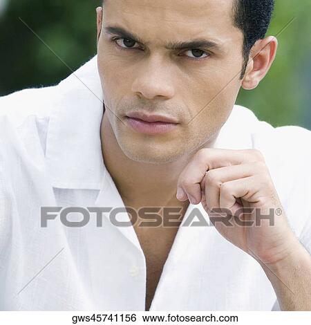 Stock Photograph - Portrait of a mid adult man. Fotosearch