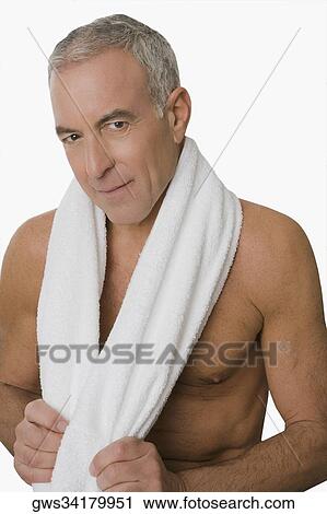 Portrait of a senior man smiling with a towel around his neck View Large Photo Image Stock Image - Portrait of a senior man smiling with a towel around his neck. Fotosearch