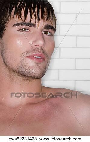 Portrait of a young man taking bath View Large Photo Image Stock Photo - Portrait of a young man taking bath. Fotosearch