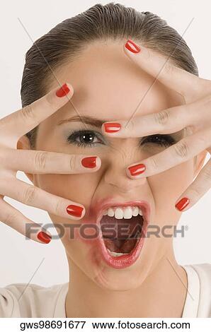 Portrait of a young woman with her messy lips View Large Photo Image Stock Photo - Portrait of a young woman with her messy lips. Fotosearch