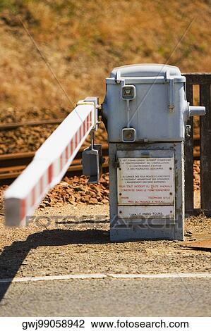 Railroad crossing along a railroad track, Loire Valley, France View Large Photo Image Stock Image - Railroad crossing along a railroad track, Loire Valley, France. Fotosearch