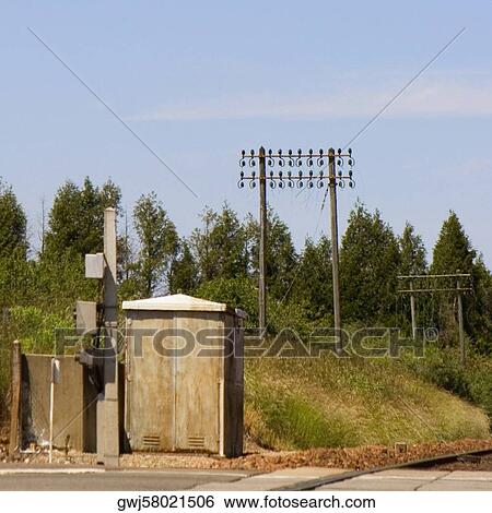 Railroad crossing along a railroad track, Loire Valley, France View Large Photo Image Stock Photograph - Railroad crossing along a railroad track, Loire Valley, France. Fotosearch