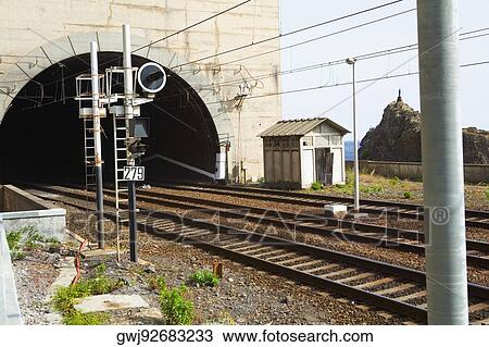 Railroad tracks passing through a tunnel, Italian Riviera, RioMaggiore, La Spezia, Genoa, Liguria, Italy View Large Photo Image Stock Image - Railroad tracks passing through a tunnel, Italian Riviera, RioMaggiore, La Spezia, Genoa, Liguria, Italy. Fotosearch