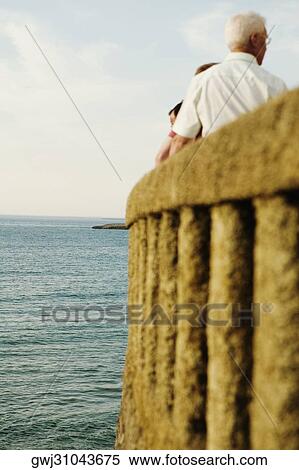 Rear view of a man at the observation point, Baie De Biarritz, Biarritz, Pyrenees-Atlantiques, France View Large Photo Image Stock Photography - Rear view of a man at the observation point, Baie De Biarritz, Biarritz, Pyrenees-Atlantiques, France. Fotosearch