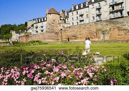 Rear view of a person walking in a garden, Le Mans, Sarthe, Pays-de-la-Loire, France View Large Photo Image Stock Image - Rear view of a person walking in a garden, Le Mans, Sarthe, Pays-de-la-Loire, France. Fotosearch