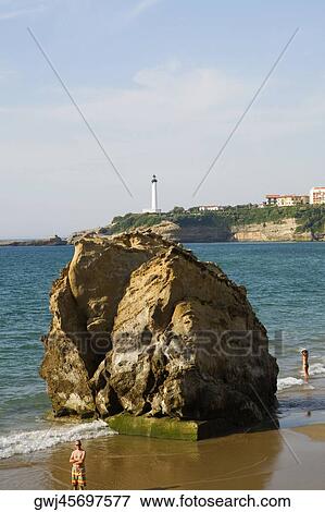 Rock on the beach, Grande Plage, Phare de Biarritz, Biarritz, France View Large Photo Image Stock Photo - Rock on the beach, Grande Plage, Phare de Biarritz, Biarritz, France. Fotosearch