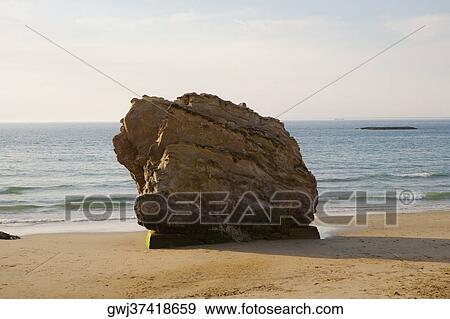 Rock on the beach, Le Basta, Biarritz, France View Large Photo Image Stock Photo - Rock on the beach, Le Basta, Biarritz, France. Fotosearch