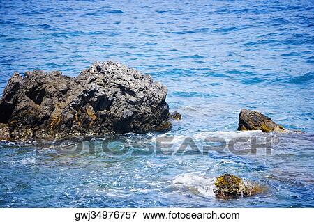 Rocks in the sea, Italian Riviera, Santa Margherita Ligure, Mar Ligure, Genoa, Liguria, Italy View Large Photo Image Stock Photo - Rocks in the sea, Italian Riviera, Santa Margherita Ligure, Mar Ligure, Genoa, Liguria, Italy. Fotosearch