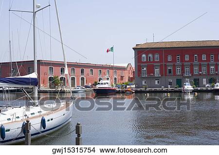 Sailboat docked at a harbor, Porto, Borgo Marinaro, Bay of Naples, Naples, Naples Province, Campania, Italy View Large Photo Image Picture - Sailboat docked at a harbor, Porto, Borgo Marinaro, Bay of Naples, Naples, Naples Province, Campania, Italy. Fotosearch