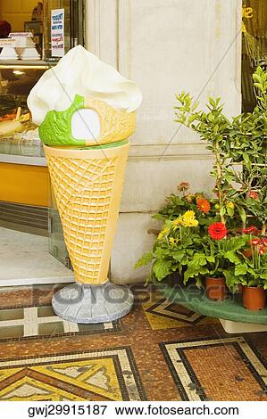 Sculpture of an ice cream cone outside of a restaurant, Via Venti Settembre, Genoa, Liguria, Italy View Large Photo Image Stock Photo - Sculpture of an ice cream cone outside of a restaurant, Via Venti Settembre, Genoa, Liguria, Italy. Fotosearch