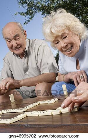 Senior couple playing dice game View Large Photo Image Stock Image - Senior couple playing dice game. Fotosearch