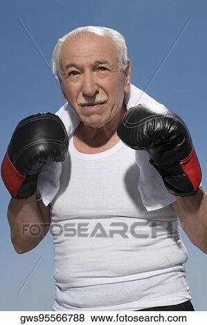 Senior man in boxing pose View Large Photo Image Stock Photo - Senior man in boxing pose. Fotosearch