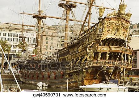 Ship at a harbor, Porto Antico, Genoa, Italy View Large Photo Image Stock Image - Ship at a harbor, Porto Antico, Genoa, Italy. Fotosearch