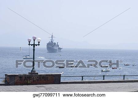 Ship with boats in the sea, Bay of Naples, Naples, Naples Province, Campania, Italy View Large Photo Image Stock Image - Ship with boats in the sea, Bay of Naples, Naples, Naples Province, Campania, Italy. Fotosearch