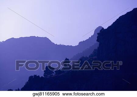 Silhouette of mountains at dawn, Costiera Amalfitana, Salerno, Campania, Italy View Large Photo Image Stock Photography - Silhouette of mountains at dawn, Costiera Amalfitana, Salerno, Campania, Italy. Fotosearch