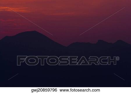 Silhouette of mountains at dusk, Mt Vesuvius, Naples, Campania, Italy View Large Photo Image Stock Photograph - Silhouette of mountains at dusk, Mt Vesuvius, Naples, Campania, Italy. Fotosearch