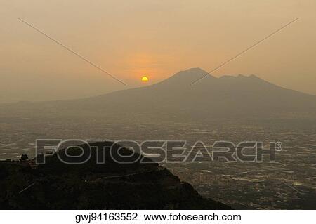 Stock Image - Silhouette of mountains at sunset, Mt Vesuvius, Naples, Campania, Italy. Fotosearch