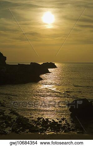 Silhouette of rocks in the ocean, Baie de Biarritz, Biarritz, France View Large Photo Image Picture - Silhouette of rocks in the ocean, Baie de Biarritz, Biarritz, France. Fotosearch