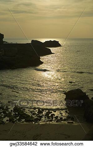 Silhouette of rocks in the ocean, Baie de Biarritz, Biarritz, France View Large Photo Image Stock Image - Silhouette of rocks in the ocean, Baie de Biarritz, Biarritz, France. Fotosearch