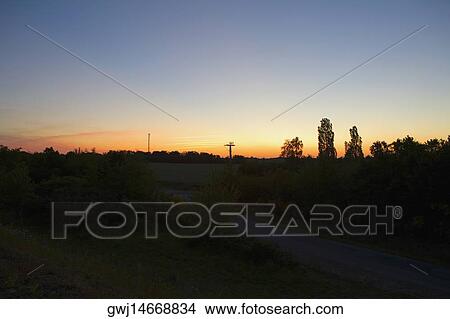 Silhouette of trees at sunset, Loire Valley, France View Large Photo Image Picture - Silhouette of trees at sunset, Loire Valley, France. Fotosearch