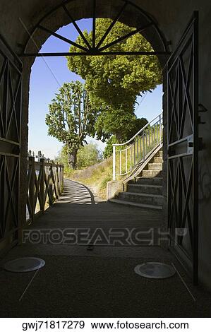 Staircase viewed through an archway, Pont Yssoir, Sarthe River, Le Mans, Sarthe, France View Large Photo Image Stock Photo - Staircase viewed through an archway, Pont Yssoir, Sarthe River, Le Mans, Sarthe, France. Fotosearch