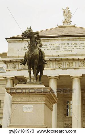 Stock Image - Statue of Giuseppe Garibaldi in front of a theatre, Piazza De Ferrari, Teatro Carlo Felice, Genoa, Italy. Fotosearch