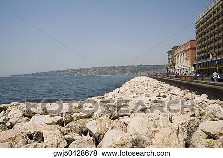 Stones at the seaside, Via Partenope, Bay of Naples, Naples, Naples Province, Campania, Italy View Large Photo Image Stock Photo - Stones at the seaside, Via Partenope, Bay of Naples, Naples, Naples Province, Campania, Italy. Fotosearch