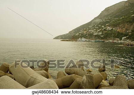 Structures at the seaside, Porto, Costiera Amalfitana, Amalfi, Salerno, Campania, Italy View Large Photo Image Picture - Structures at the seaside, Porto, Costiera Amalfitana, Amalfi, Salerno, Campania, Italy. Fotosearch