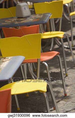 Tables and chairs at a sidewalk cafe, Sorrento, Sorrentine Peninsula, Naples Province, Campania, Italy View Large Photo Image Stock Photograph - Tables and chairs at a sidewalk cafe, Sorrento, Sorrentine Peninsula, Naples Province, Campania, Italy. Fotosearch