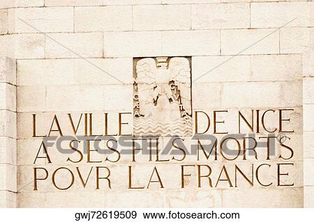 Stock Photo - Text carved on a wall, Monument Aux Morts, Cote d'Azur, Cannes, Provence-Alpes-Cote D'Azur, France. Fotosearch