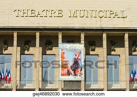 Stock Image - Text mounted on the wall of a movie theater, Theatre Municipal, Le Mans, Sarthe, France. Fotosearch