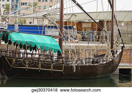 Tourboat at a harbor, Porto Antico, Genoa, Liguria, Italy View Large Photo Image Stock Photo - Tourboat at a harbor, Porto Antico, Genoa, Liguria, Italy. Fotosearch