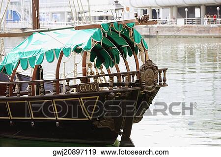 Tourboat in a river, Porto Antico, Genoa, Liguria, Italy View Large Photo Image Stock Photo - Tourboat in a river, Porto Antico, Genoa, Liguria, Italy. Fotosearch