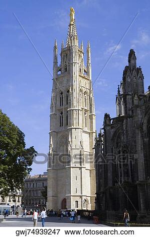 Tourists at a church, St. Andre Cathedral, Tour Pey Berland, Bordeaux, Aquitaine, France View Large Photo Image Stock Photo - Tourists at a church, St. Andre Cathedral, Tour Pey Berland, Bordeaux, Aquitaine, France. Fotosearch