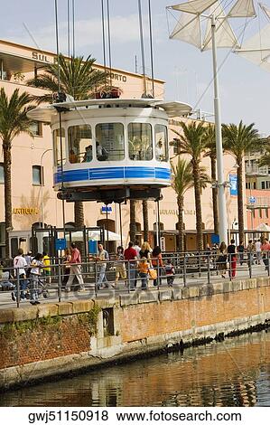 Tourists at the port, Porto Antico, Genoa, Italy View Large Photo Image Stock Photo - Tourists at the port, Porto Antico, Genoa, Italy. Fotosearch