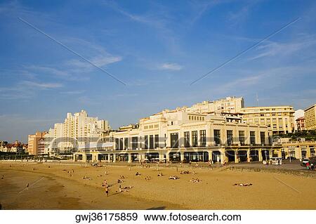 Tourists on the beach, Casino Municipal, Grande Plage, Biarritz, France View Large Photo Image Stock Photo - Tourists on the beach, Casino Municipal, Grande Plage, Biarritz, France. Fotosearch