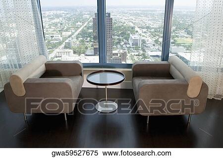 Two armchairs in a hotel View Large Photo Image Stock Photography - Two armchairs in a hotel. Fotosearch