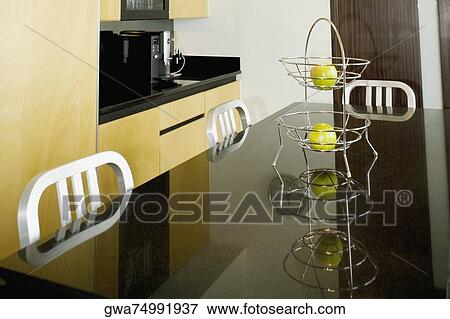 Picture Of Two Oranges In A Fruit Stand On Dining Table Picture Two Oranges In A Fruit Stand On Dining Table Fotosearch Search