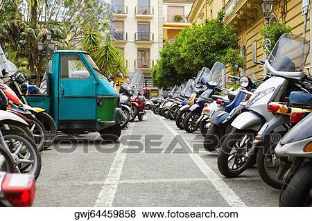 Vehicles parked at a parking lot, Sorrento, Naples Province, Campania, Italy View Large Photo Image Stock Photo - Vehicles parked at a parking lot, Sorrento, Naples Province, Campania, Italy. Fotosearch