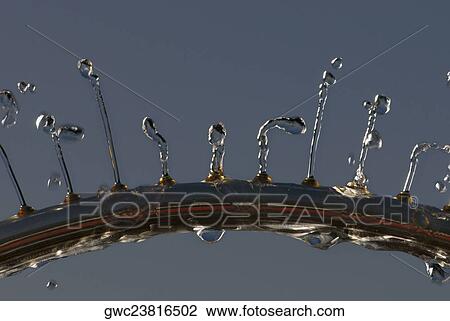 Water spraying from a fountain View Large Photo Image Stock Image - Water spraying from a fountain. Fotosearch