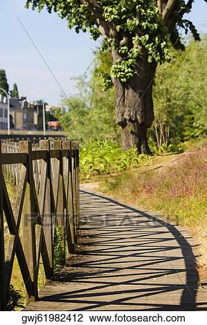 Stock Image - Wooden fence in a park, Le Mans, Sarthe, Pays-de-la-Loire, France. Fotosearch