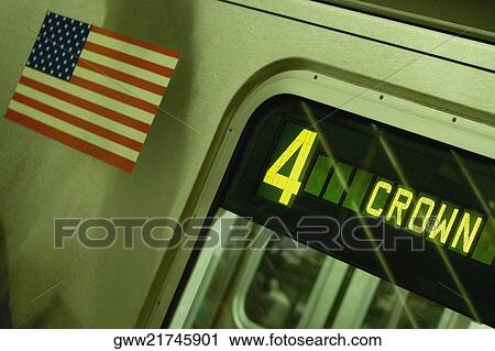 Stock Image - American flag on a subway train. Fotosearch