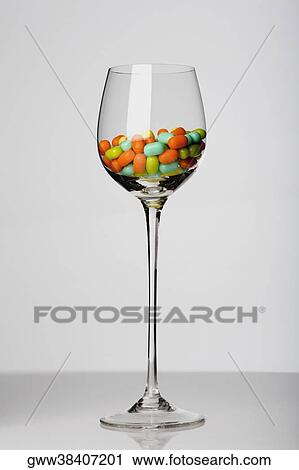 Candy in a stem glass View Large Photo Image Stock Image - Candy in a stem glass. Fotosearch
