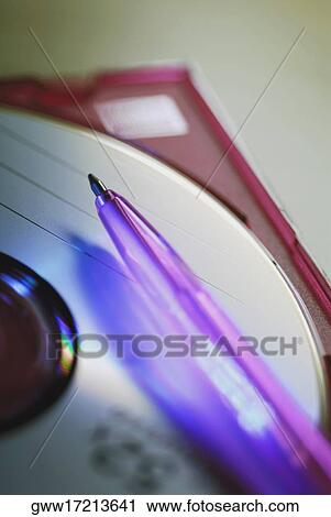 Close-up of a ballpoint pen on a CD View Large Photo Image Stock Image - Close-up of a ballpoint pen on a CD. Fotosearch