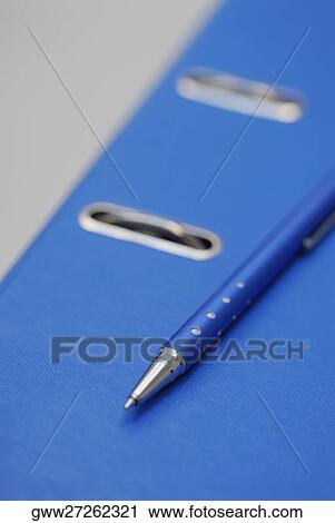 Close-up of a ballpoint pen on a ring binder View Large Photo Image Stock Image - Close-up of a ballpoint pen on a ring binder. Fotosearch