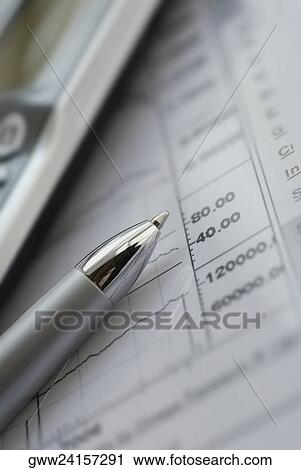 Stock Image - Close-up of a ballpoint pen on a document. Fotosearch