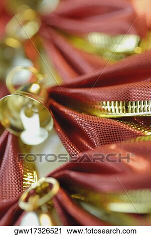 Close-up of a bell with bows View Large Photo Image Stock Image - Close-up of a bell with bows. Fotosearch