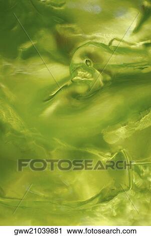 Close-up of a beverage in a glass View Large Photo Image Stock Image - Close-up of a beverage in a glass. Fotosearch