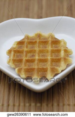 Close-up of a biscuit in a heart shape plate View Large Photo Image Stock Image - Close-up of a biscuit in a heart shape plate. Fotosearch